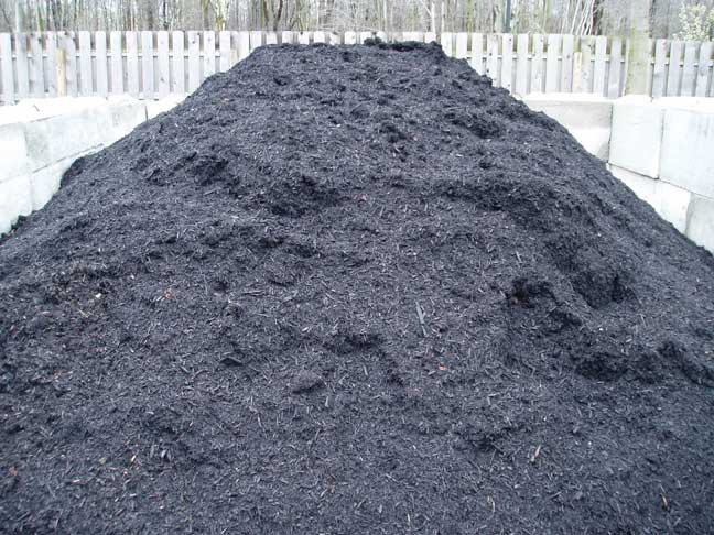 Photo: Mr. Yard Original Triple Processed Bark Mulch Pile  Color Enhanced Black